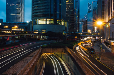 High angle view of light trails on multiple lane highway in city