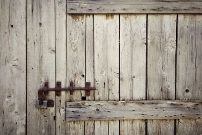 Full frame shot of wooden door and wall