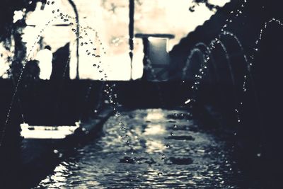 City viewed through wet window