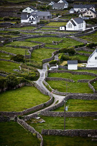 High angle view of houses and walls in village