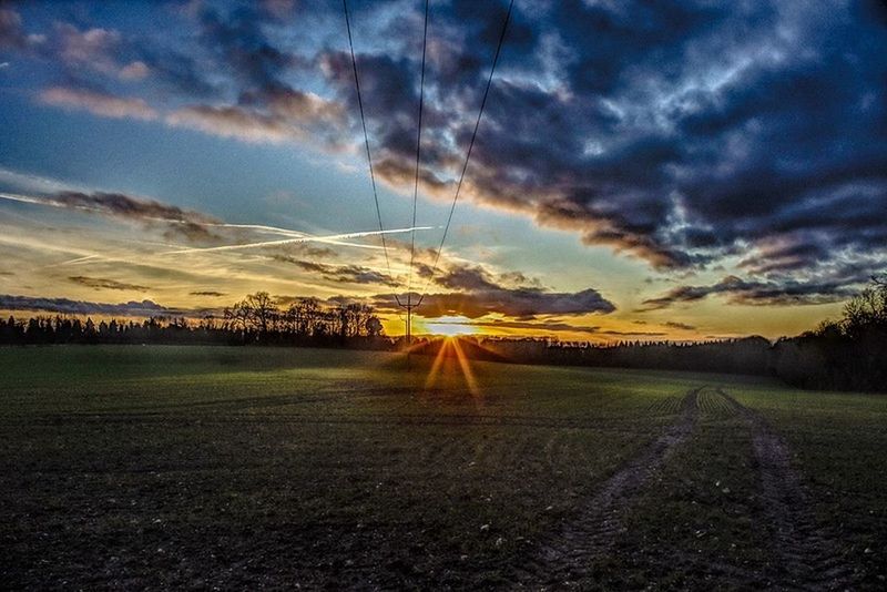 beauty in nature, nature, tranquility, field, tranquil scene, scenics, cloud - sky, sky, landscape, sunset, agriculture, no people, rural scene, grass, outdoors, day