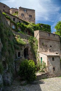 Old historic building of sorano  in tuscany against sky