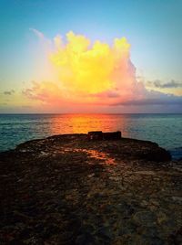 Scenic view of sea at sunset