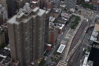 High angle view of street amidst buildings in city