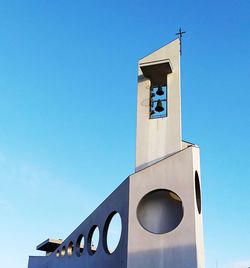 Low angle view of church against clear blue sky