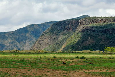 Scenic mountain against a cloudy sky, mount suswa, rift valley, kenya