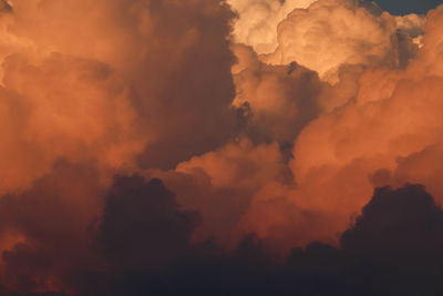 Low angle view of dramatic sky during sunset