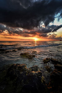Scenic view of sea against sky during sunset