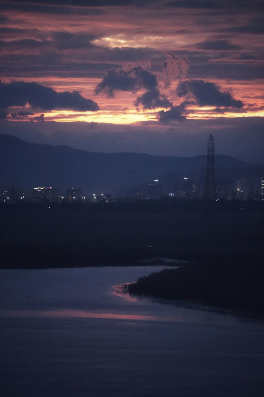 SCENIC VIEW OF SEA AGAINST ORANGE SKY