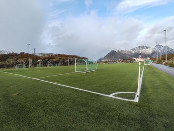 Soccer field against sky