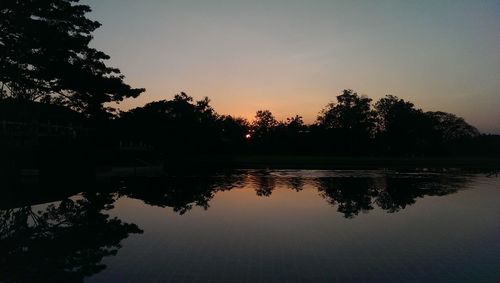 Silhouette of trees at sunset