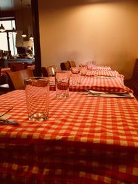 Empty chairs and tables in restaurant