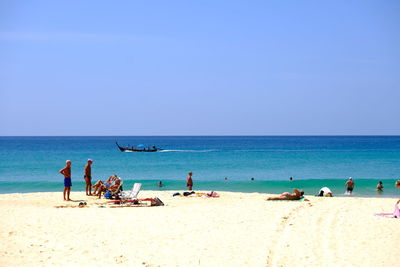 Scenic view of beach against clear sky