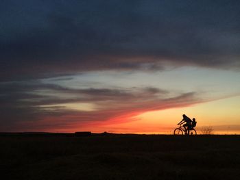 Scenic view of landscape at sunset