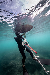 Man swimming in sea