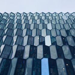 Low angle view of modern building against clear sky