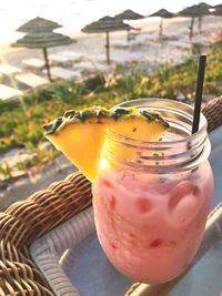 Close-up of drink in glass jar on table