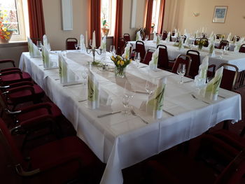 Empty chairs and table in office