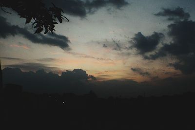 Silhouette trees against sky during sunset