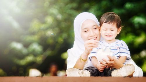 Portrait of a boy with mother and son