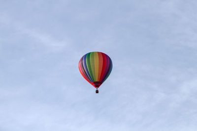 Low angle view of hot air balloon flying in sky