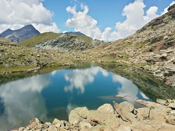 Scenic view of lake with mountains in background