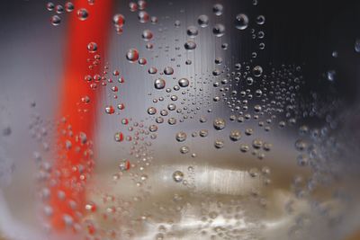 Full frame shot of wet glass window