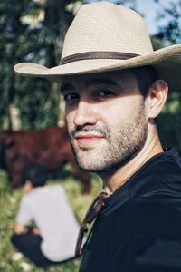 Portrait of young man wearing hat