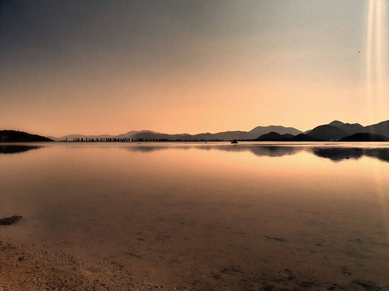 SCENIC VIEW OF SEA DURING SUNSET