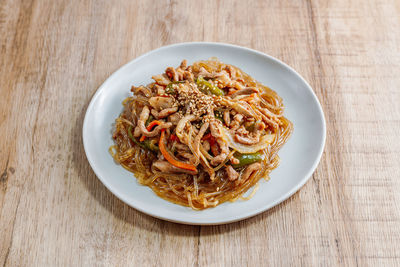 High angle view of pasta in plate on table