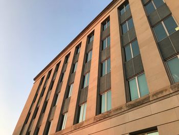 Low angle view of modern building against clear sky