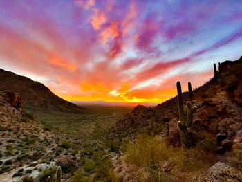 Scenic view of mountains against sky during sunset