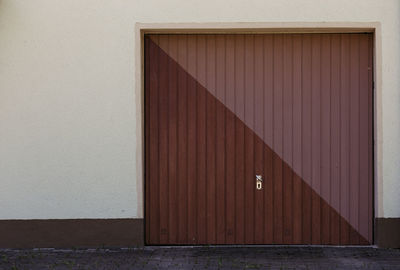 View of brown door on wall