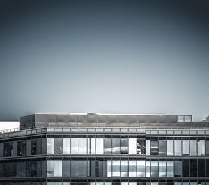 Low angle view of modern building against clear sky