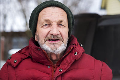 Portrait of man in snow