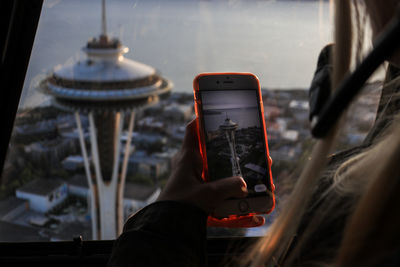 A helicopters view of the space needle in seattle washington