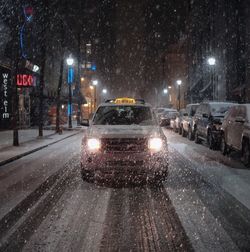 Illuminated street lights at night