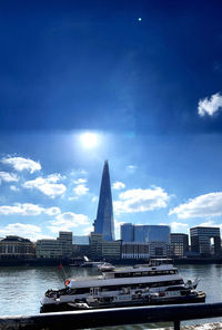 View of buildings against cloudy sky