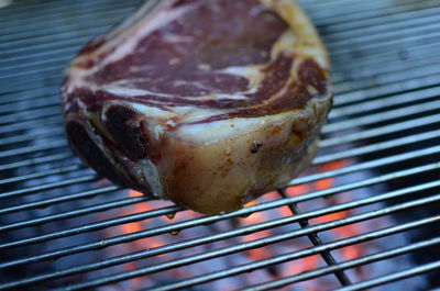 Close-up of bread on metal grate