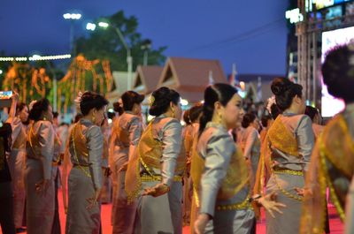 Crowd in city at night