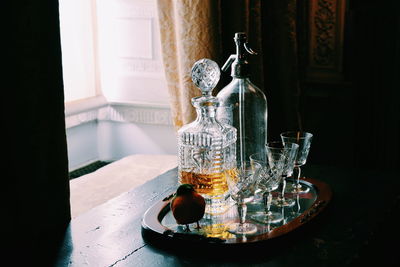 Alcohol in bottle on table