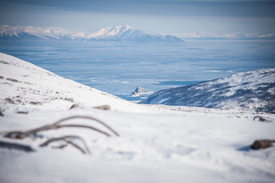 Scenic view of snowcapped mountains against sky