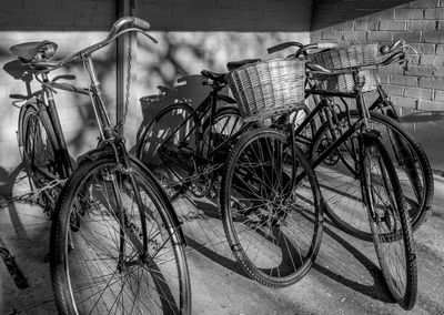 Bicycle parked against wall