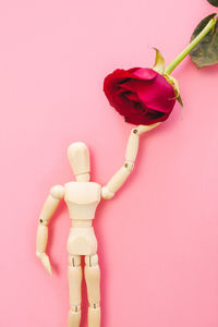 Close-up of pink toy against white background