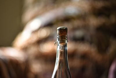 Close-up of beer bottle against blurred background