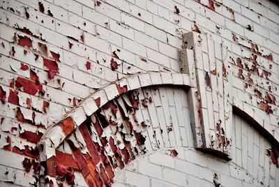 Low angle view of weathered wall