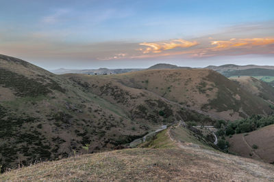 Scenic view of mountains against sky during sunset