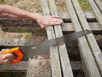 Farmer working on wood