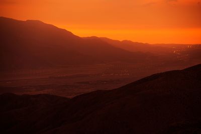 Scenic view of mountains against sky during sunset