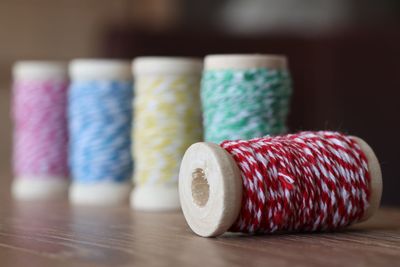 Close-up of thread on table